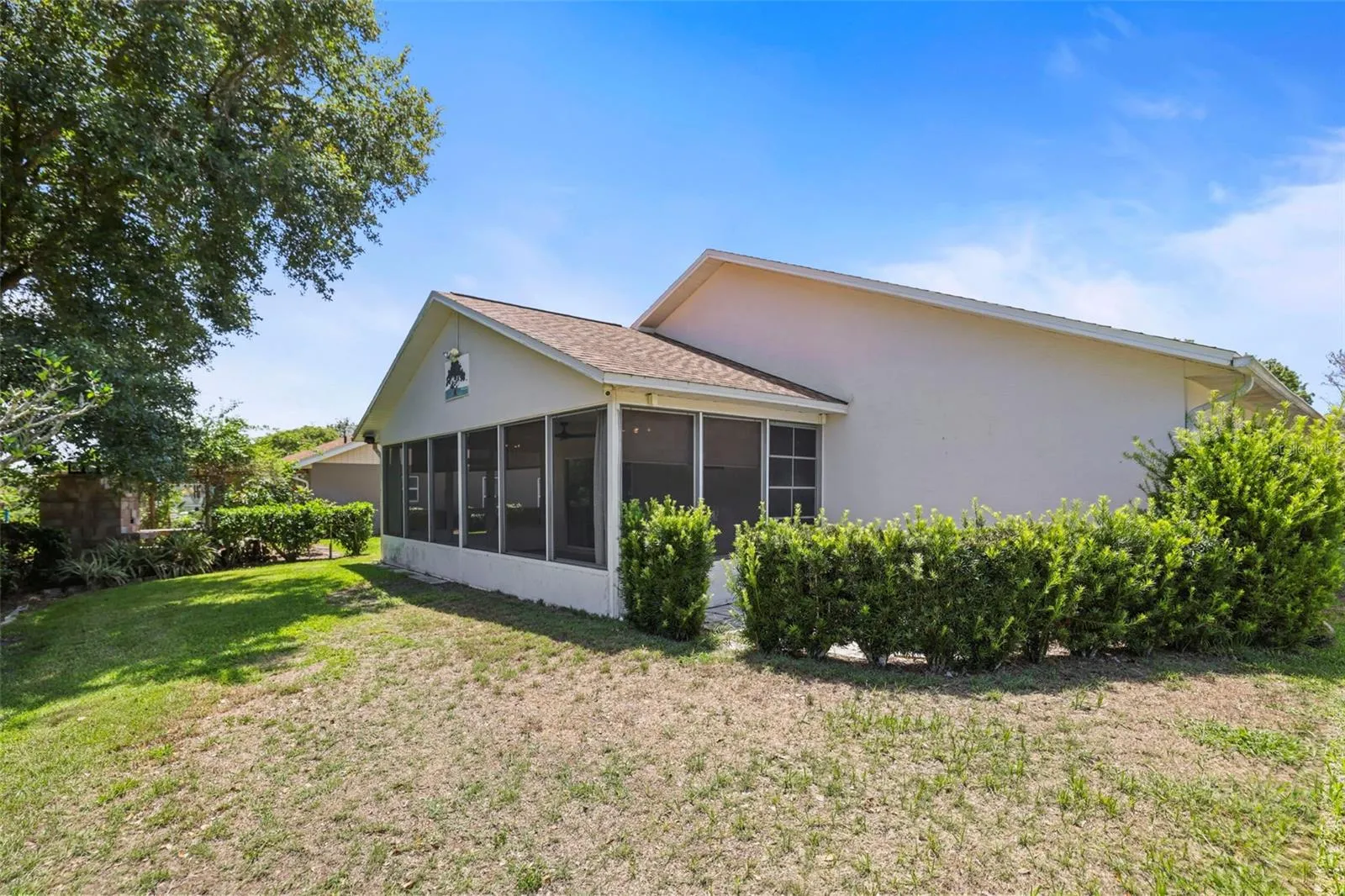 Enclosed rear porch allows Panoramic views of the golf course.