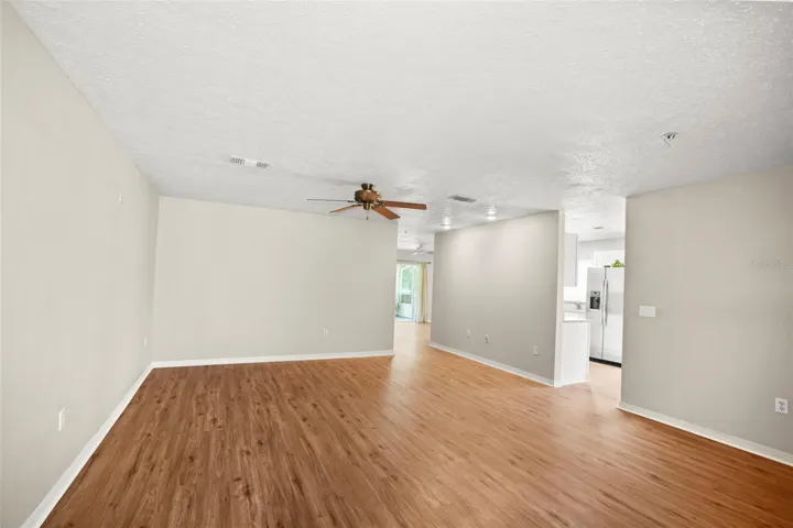 Spacious Livingroom from the front door with a view of the kitchen