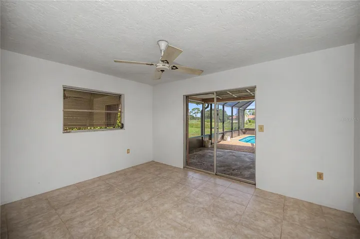 Primary bedrom with sliders to the lanai