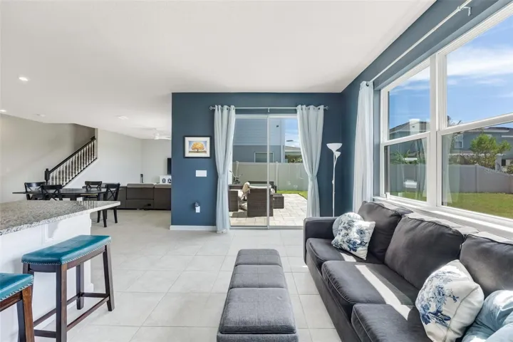 MORNING ROOM WITH EXTRA SEATING AND CABINETS