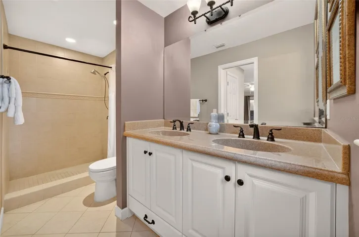 DOUBLE SINKS LARGE STEP-IN TILE SHOWER