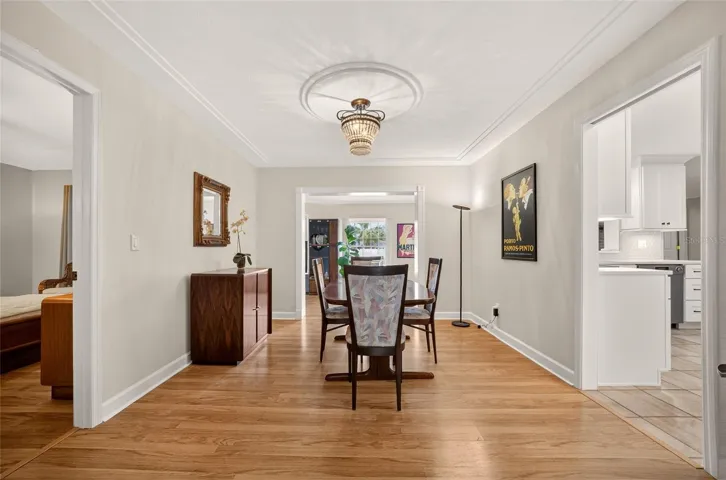 DINING ROOM WITH VIEW OF POOL