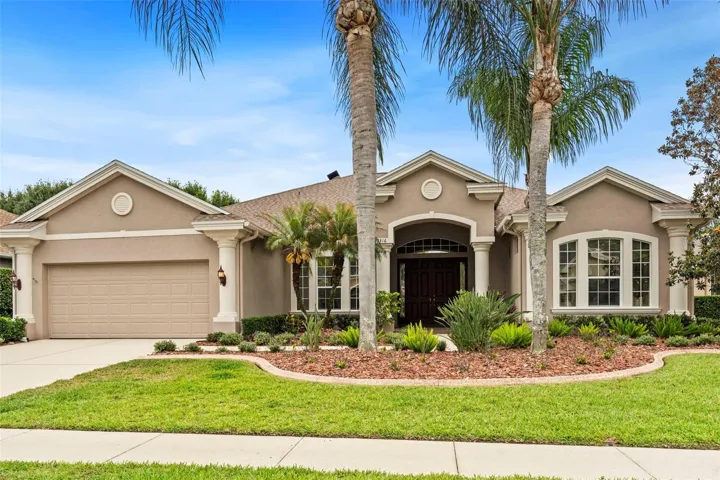 Welcome to 23316 Gracewood Circle - fantastic curb appeal - mature lush land scaping