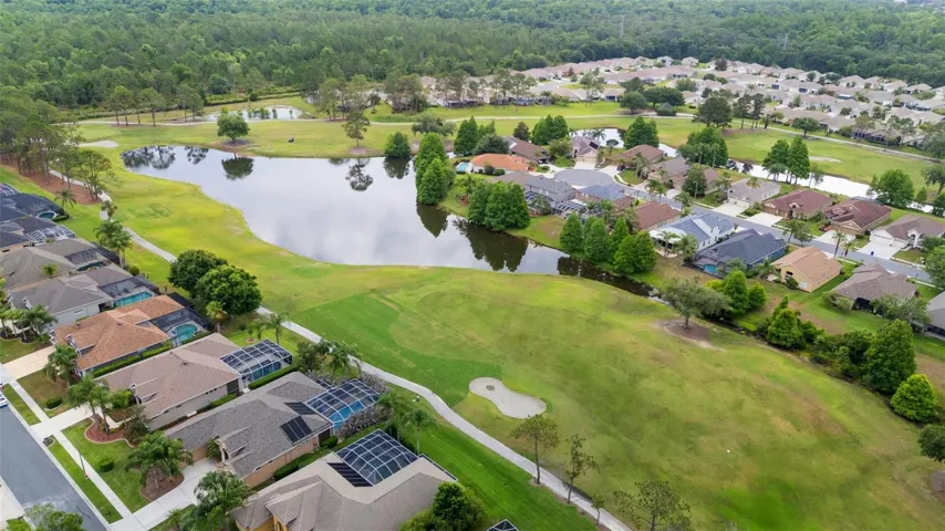 Aerial view of neighborhood and golf course