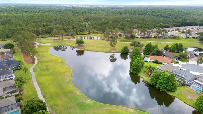 Pond and golf course view from rear of home