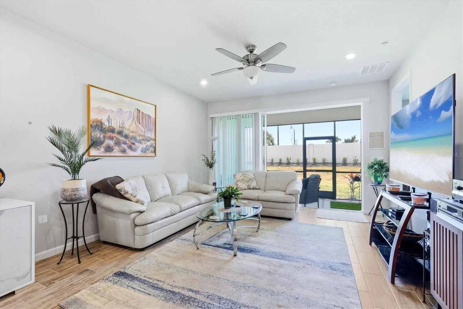 Great room opens up to lanai, for indoor-outdoor living.