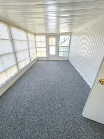 Florida room without furniture virtually staged