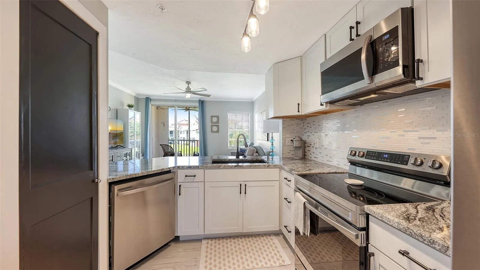 Solid wood cabinets, stainless appliances and granite countertops.