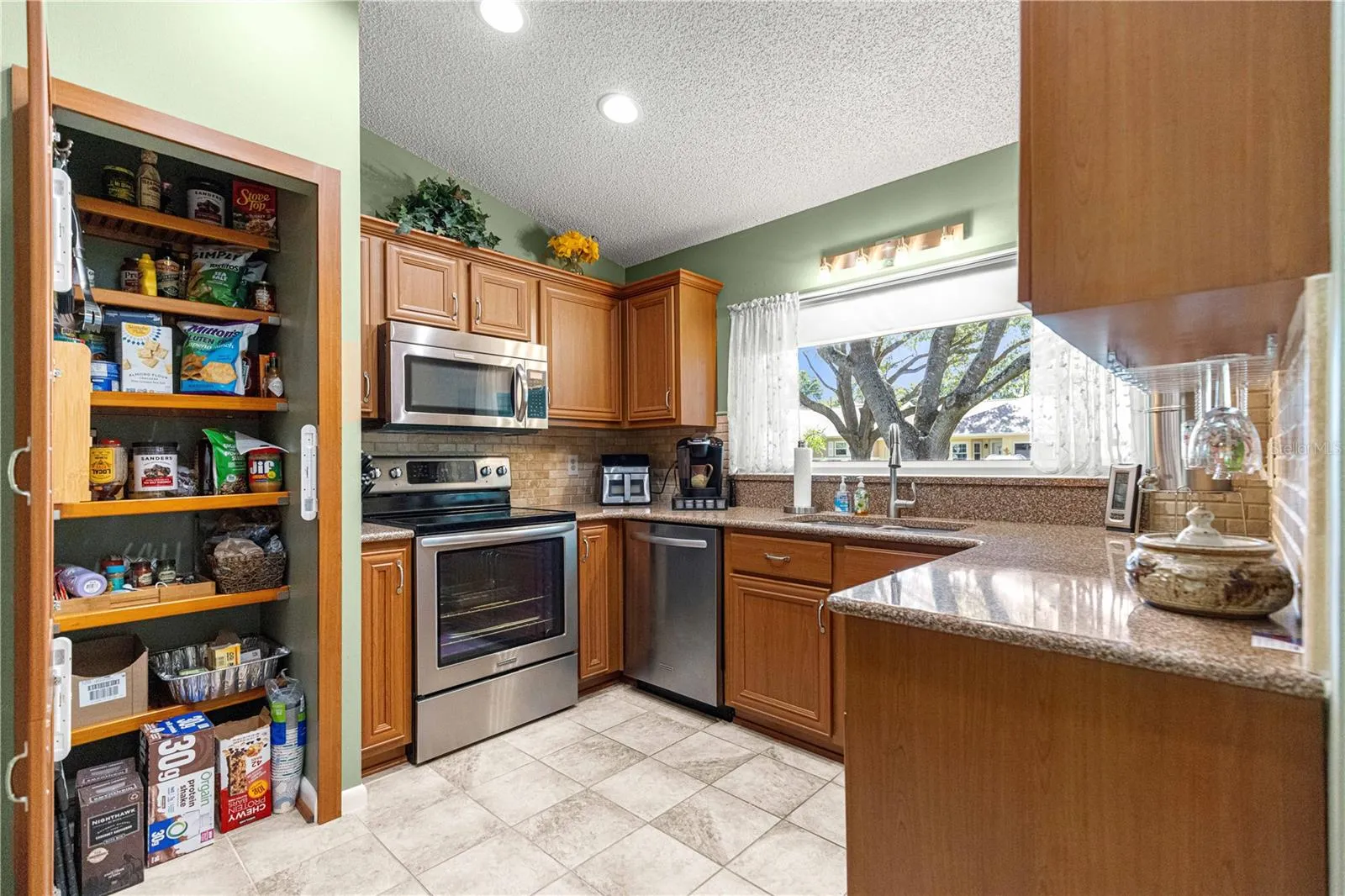 KITCHEN -  LARGE PANTRY WITH BUILT-IN SHELVES