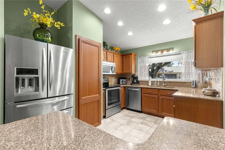 KITCHEN  - NEWER APPLIANCES, CABINETS AND COUNTERTOPS