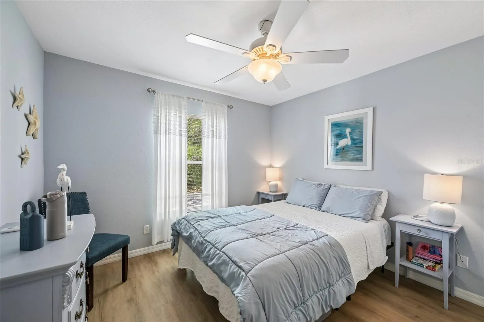 GUEST BEDROOM WITH WINDOW OVERLOOKING THE FRONT
