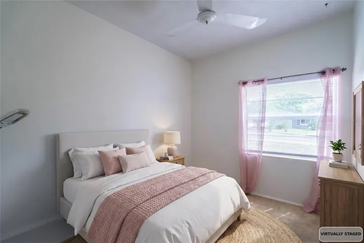 Virtually staged guest bedroom 1