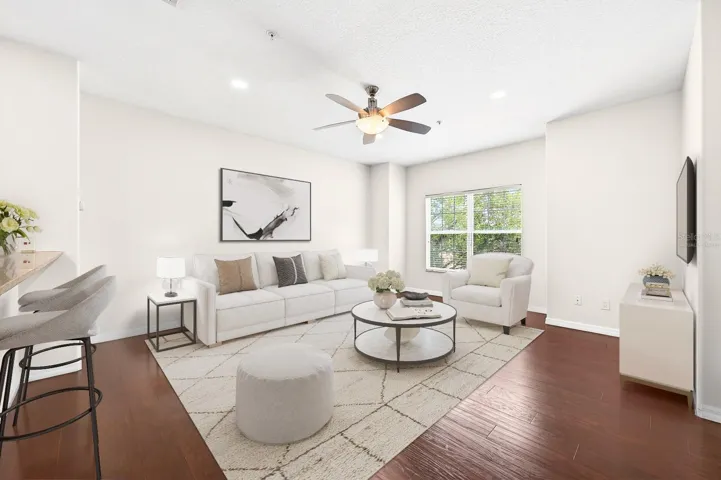 Upstairs on the second level, the main living space is BRIGHT, OPEN, and perfect for both everyday living and entertaining. Virtually Staged