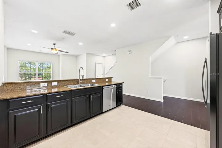 A generous Kitchen island provides extra prep space and room for counter-height seating.