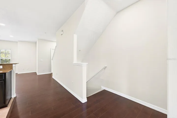 Inside, you’ll find LUXURY VINYL PLANK FLOORING throughout all three levels, creating a cohesive and modern feel.