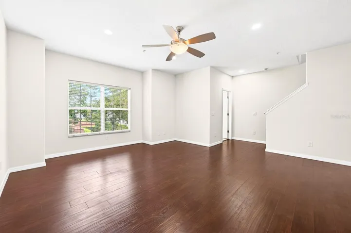 Upstairs on the second level, the main living space is BRIGHT, OPEN, and perfect for both everyday living and entertaining.