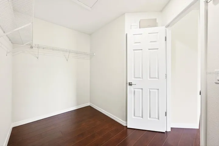 The Primary Suite walk-in closet.