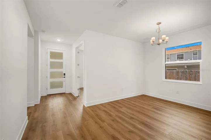 Front entry leads to the den and dining room
