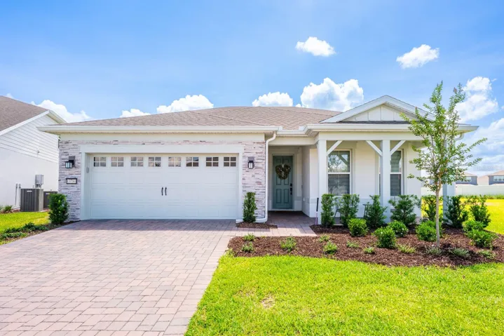 Welcome to this elegant and NEARLY NEW 4-bedroom, 3-bath home in the highly sought-after Del Webb Oasis of Winter Garden, a GUARD-GATED 55+ community where luxury, comfort, and lifestyle come together beautifully!