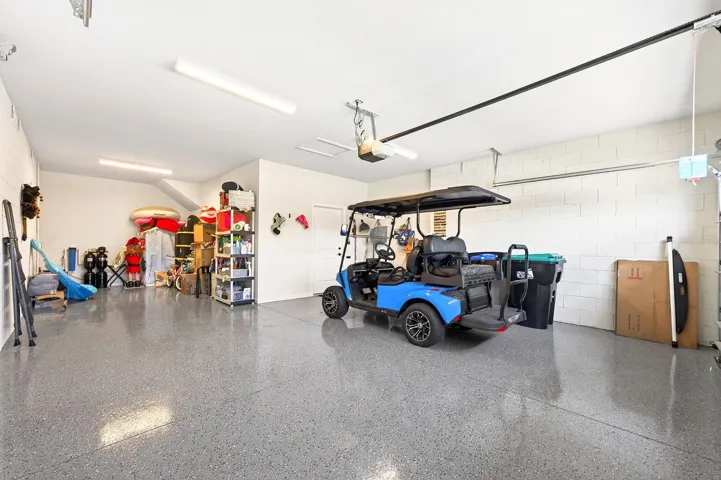 From the moment you arrive, the home impresses with its REFINED CURB APPEAL and spacious 2-car garage with an additional TANDEM BAY—ideal for a golf cart or extra storage.