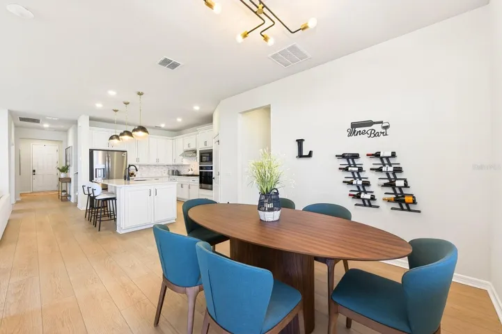Enjoy a comfortable Dining space just off the Kitchen, a welcoming spot for casual meals and everyday gatherings.