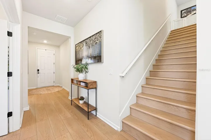LUXURY VINYL PLANK FLOORING flows seamlessly through the home.