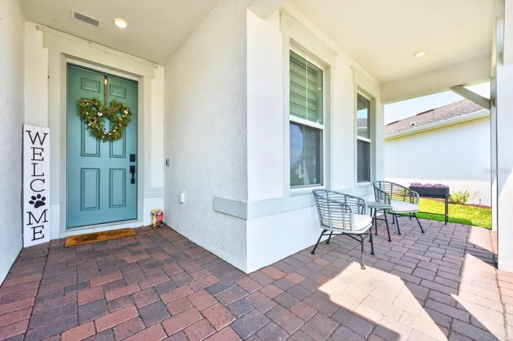 From the moment you arrive, the home impresses with its REFINED CURB APPEAL and spacious 2-car garage with an additional TANDEM BAY—ideal for a golf cart or extra storage.