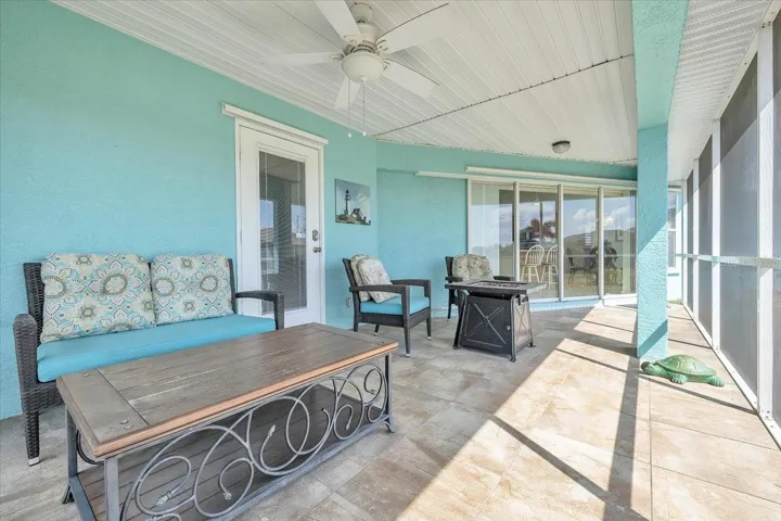 covered and screened lanai with tile flooring