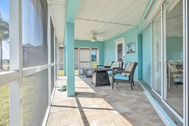 covered and screened lanai with tile flooring