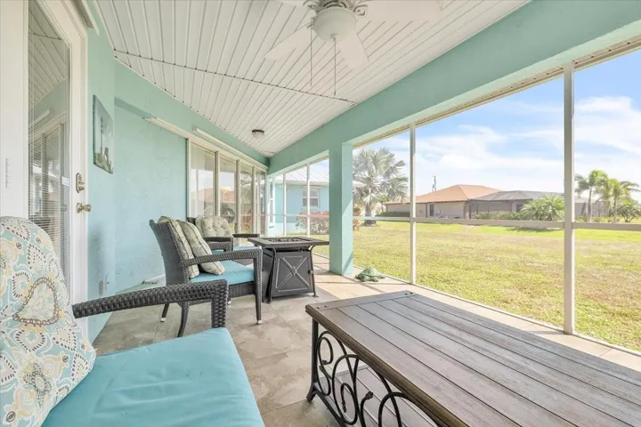 covered and screened lanai with tile flooring