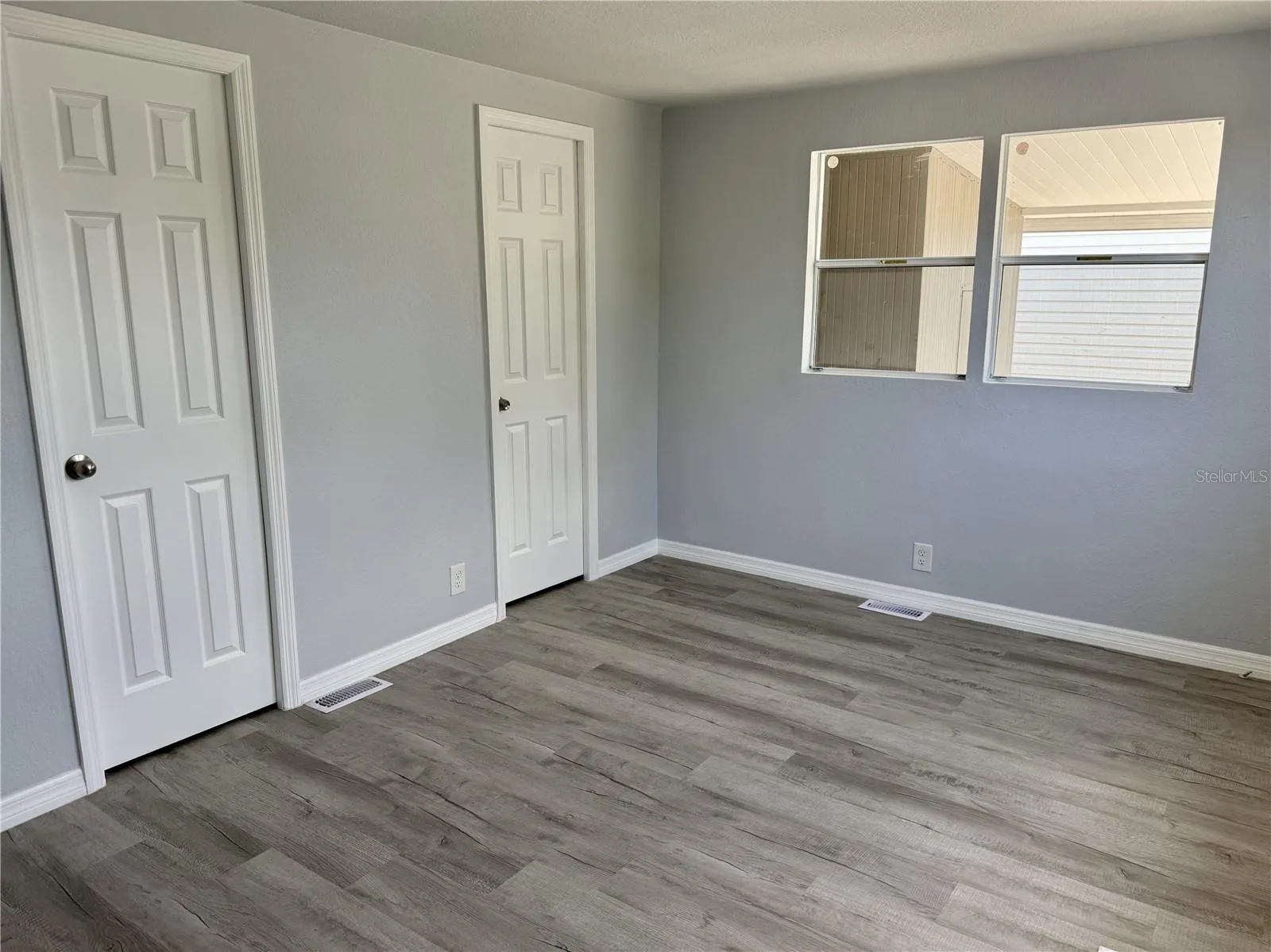 Primary bedroom with walk in closet