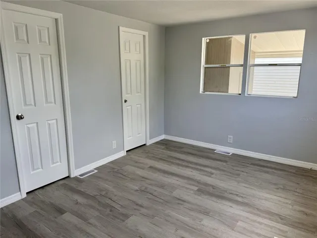 Primary bedroom with walk in closet