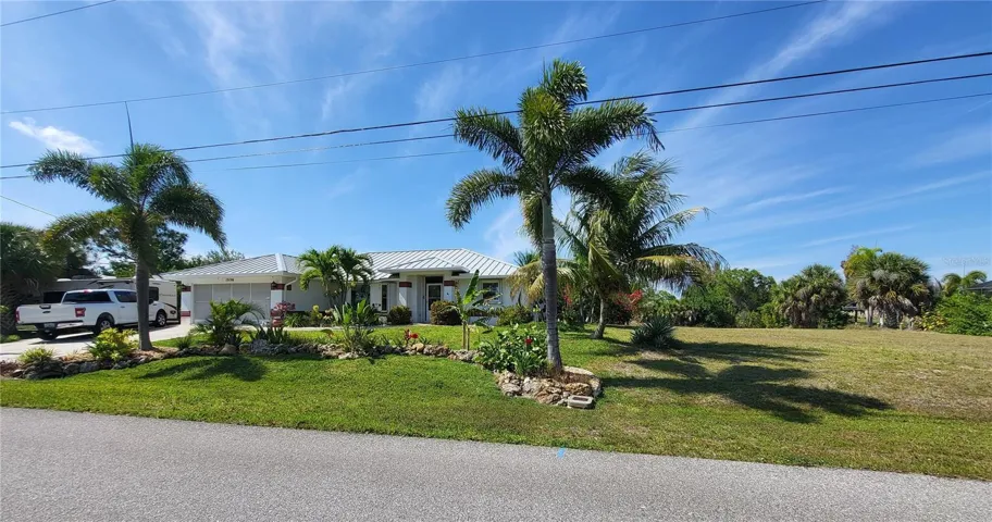 Neighboring homes are nicely landscaped.