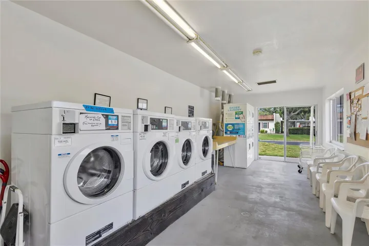 Laundry Area/other owners have added stacked washer and dryer inside their unit