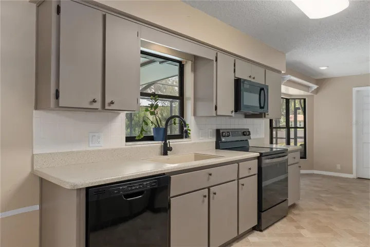 Galley Kitchen overlooking pool (Picture 1)