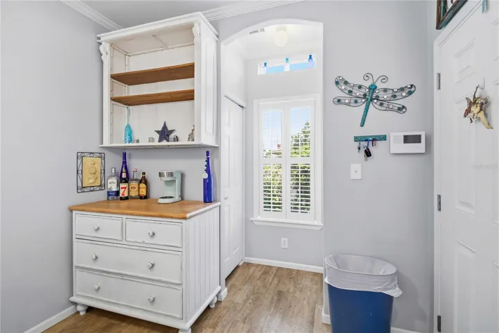 Laundry closet is in door behind hutch.