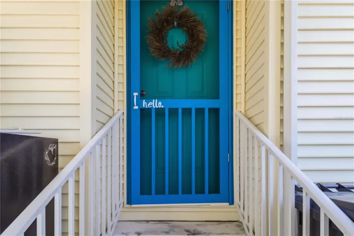 Hello! Cheery entrance from carport.