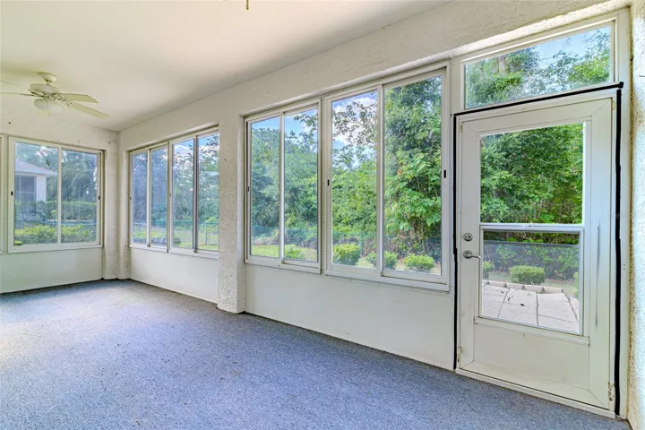 Florida room with acrylic windows and great view of the backyard