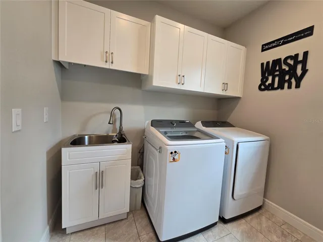 Washer & Dryer plus upgraded sink & cabinets