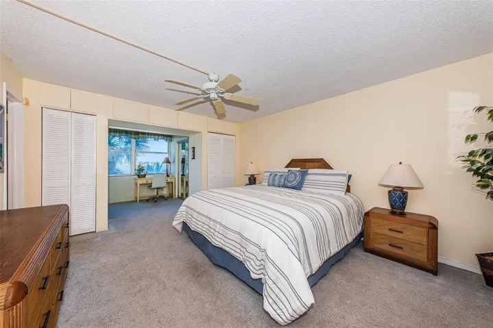 Primary bedroom with access to sunroom