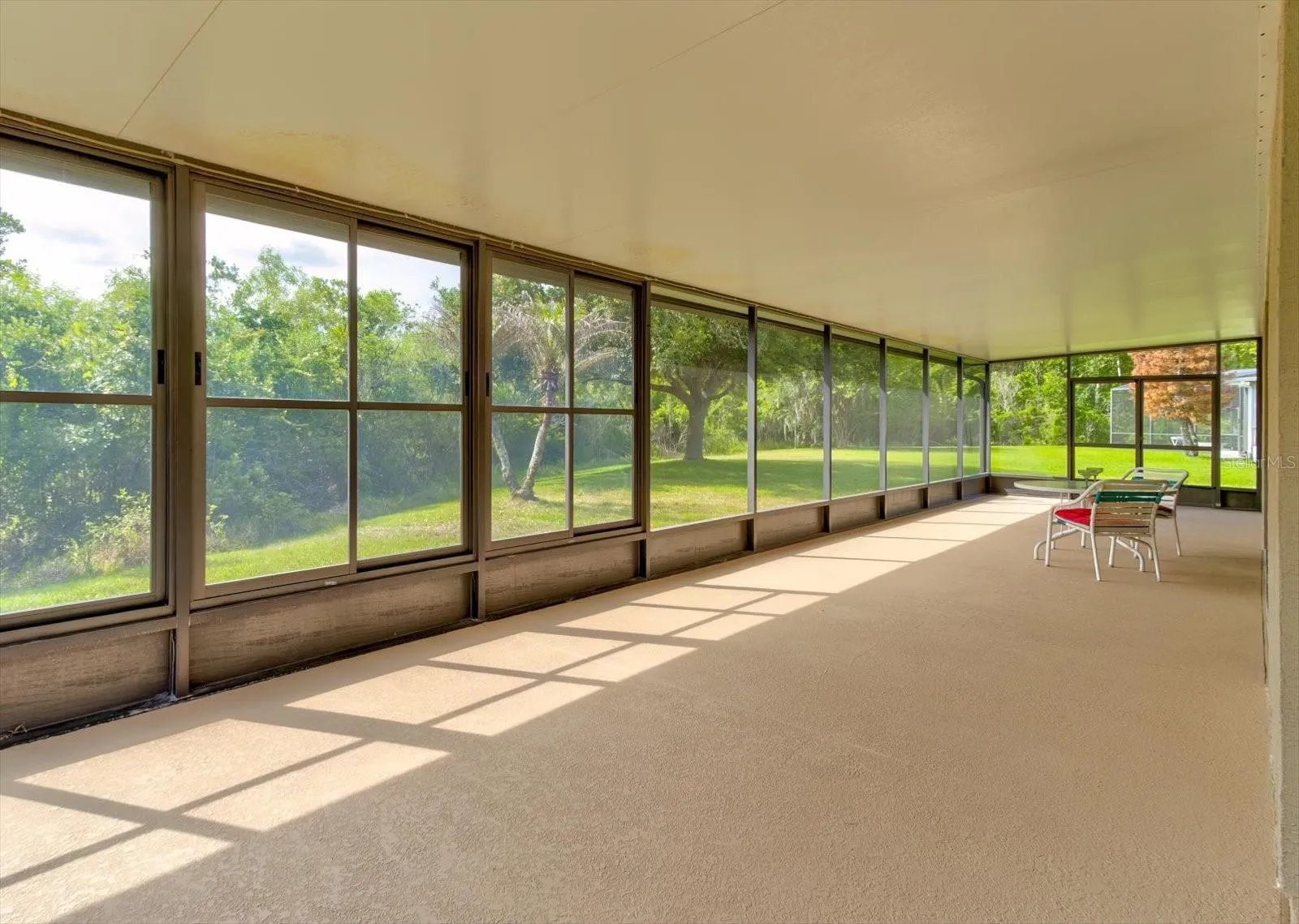 HUGE outdoor living space with conservation view