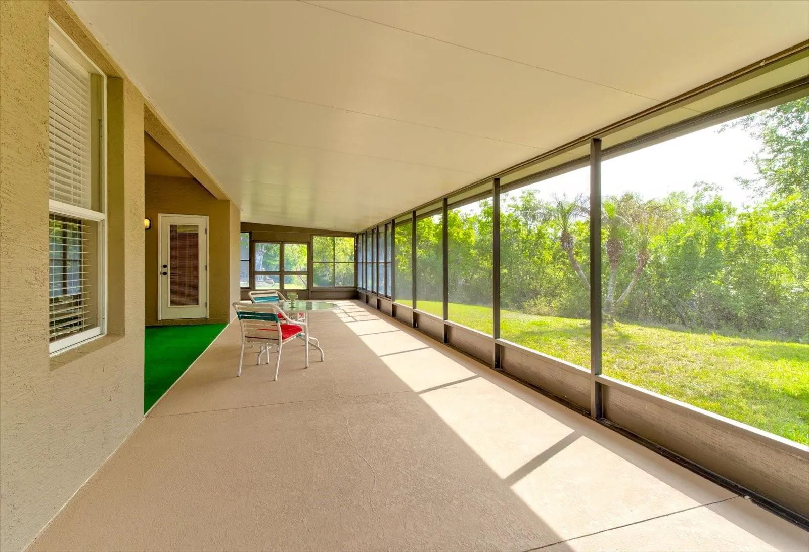Covered patio alongside the whole home