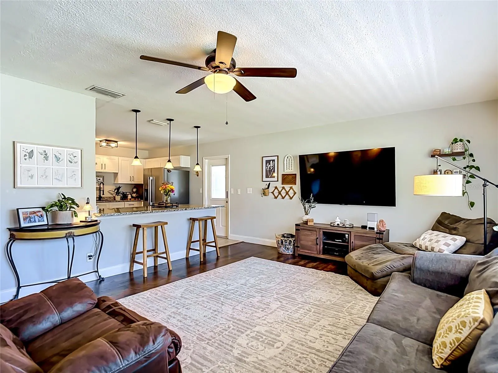Open Floor Plan with Large Living Room overlooking Kitchen