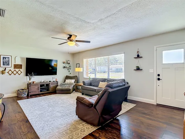 Warm Wood Style Flooring and Large Window provides such a welcoming atmosphere