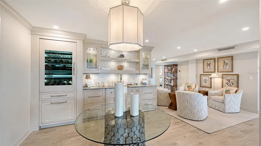 Full-service bar w/ integrated Monogram Wine & Beverage cooler (with ice-maker)