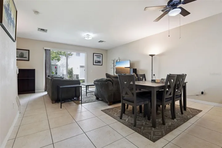 Living area features new sliding doors out to the backyard