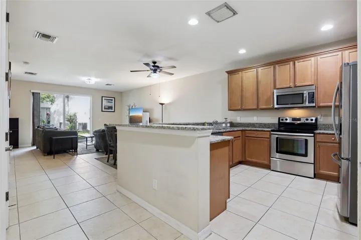Spacious open floor plan with easy to clean tile throughout the downstairs
