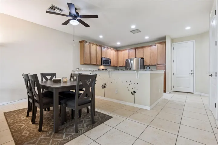Dining room along with a large breakfast bar allows plenty of space for gatherings