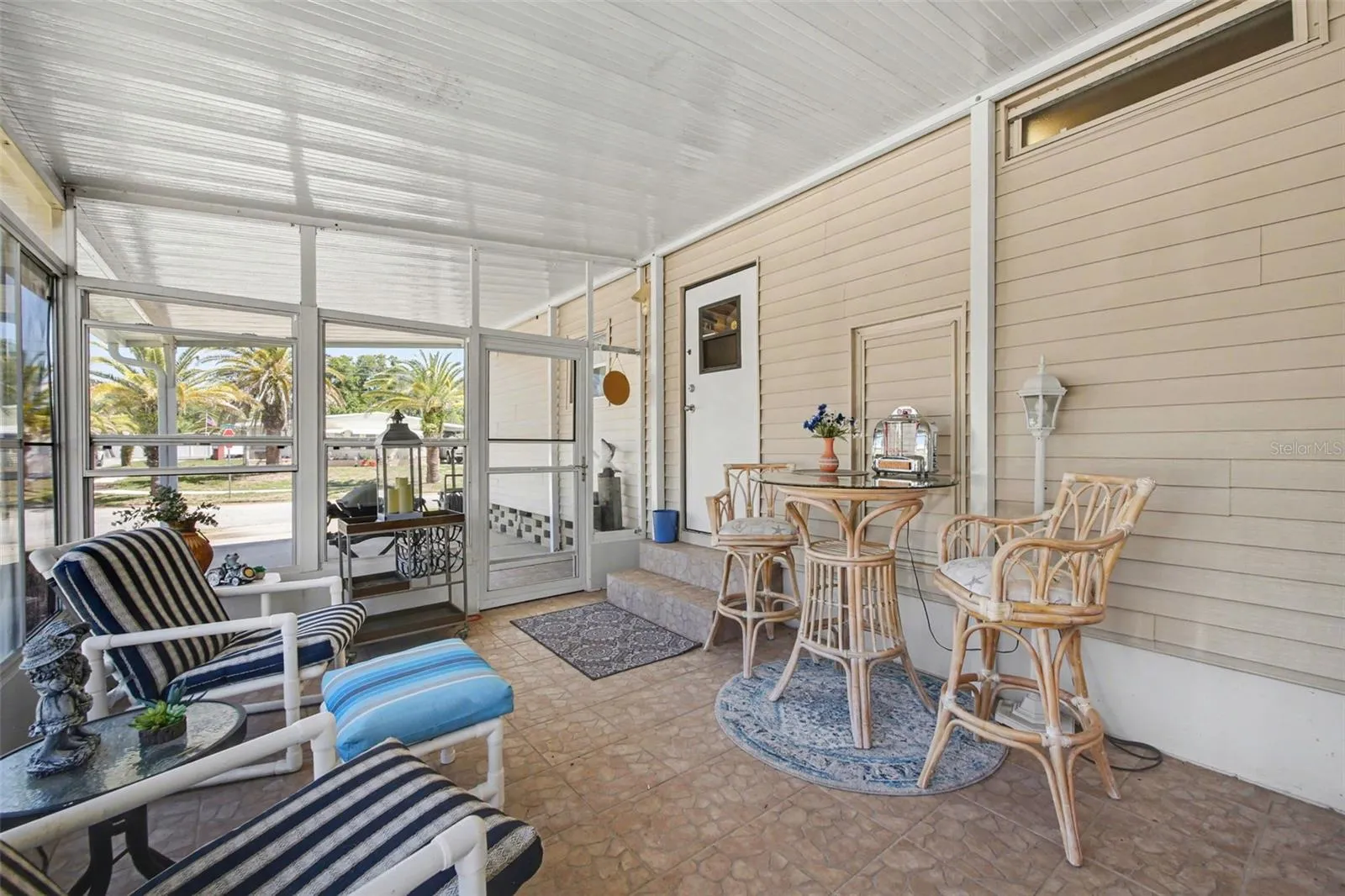 Enjoy sitting in the enclosed screen patio.