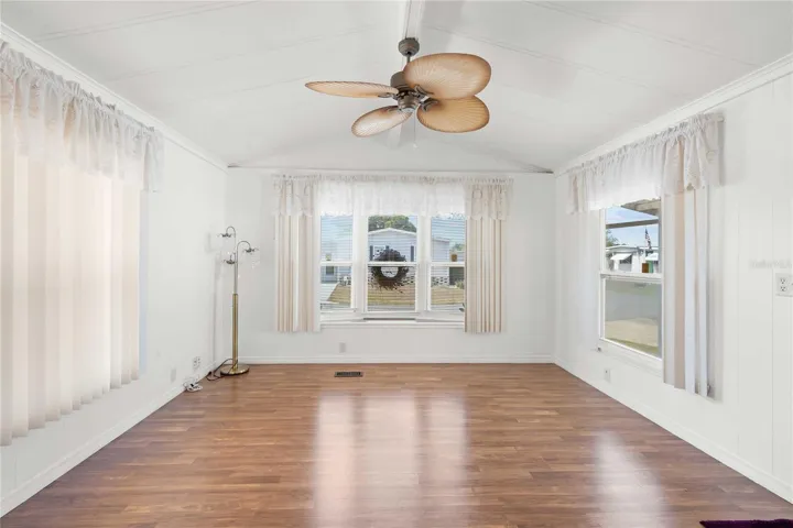 Ceiling fan and laminate flooring.